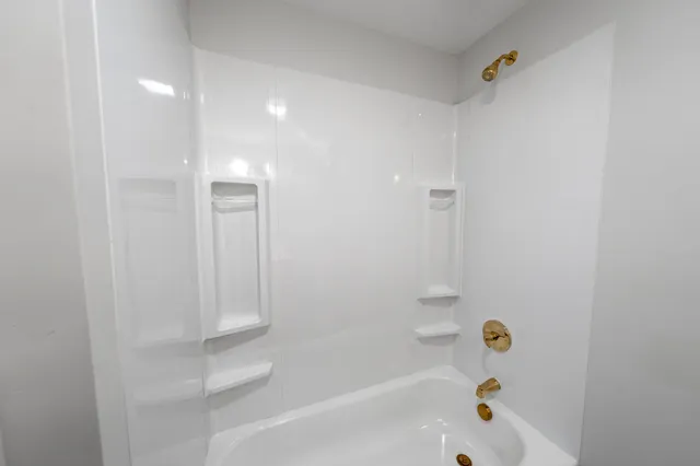 a bathroom with a bathtub