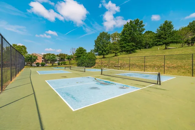 an aerial view of city parking and river