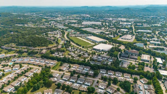 a view of a backyard with a small cabin