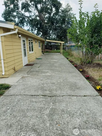 a view of house with outdoor space