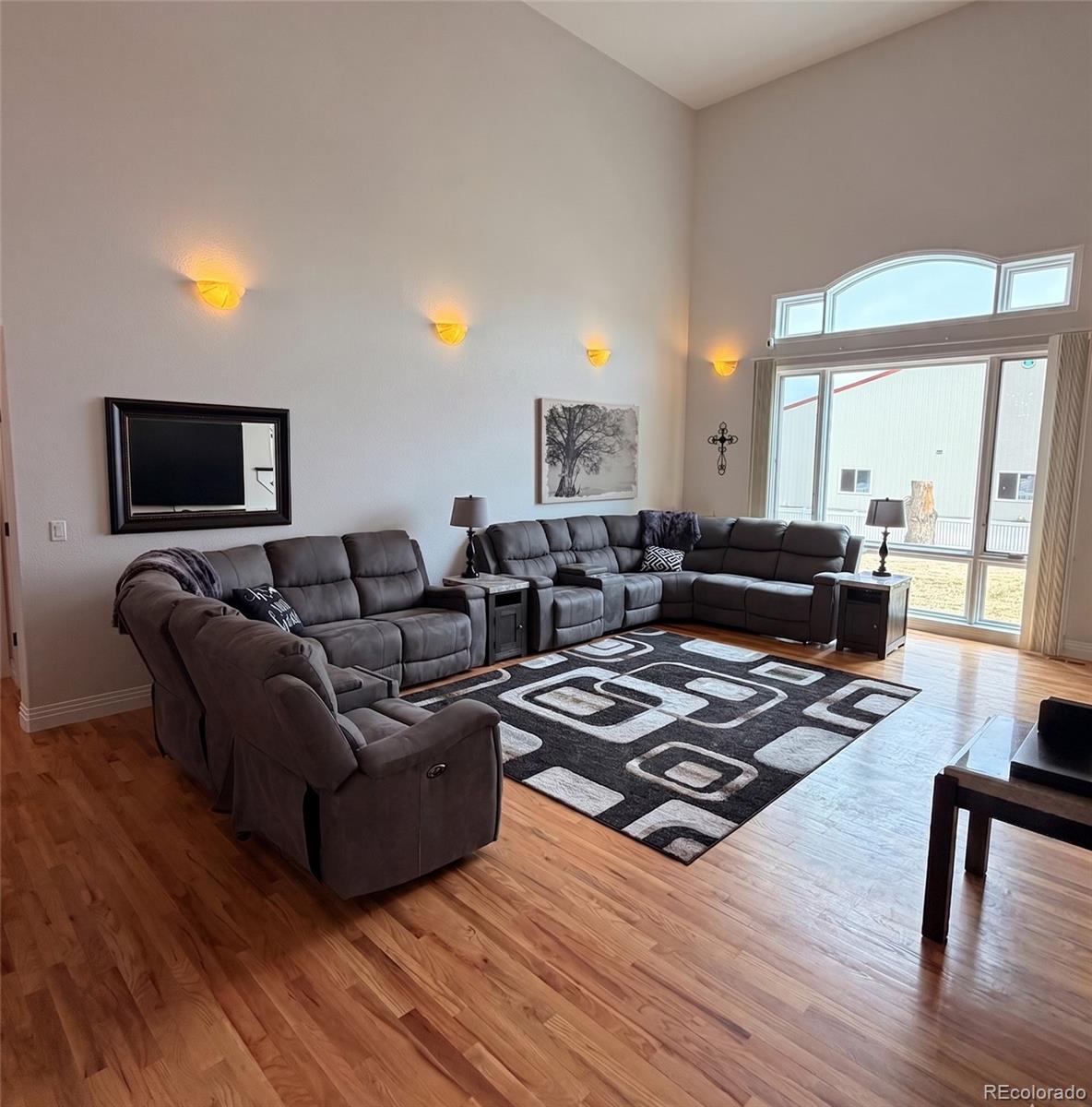 17900 County Road 5 Berthoud, CO 80513 - Photo 8 of 21 a living room with furniture and a flat screen tv