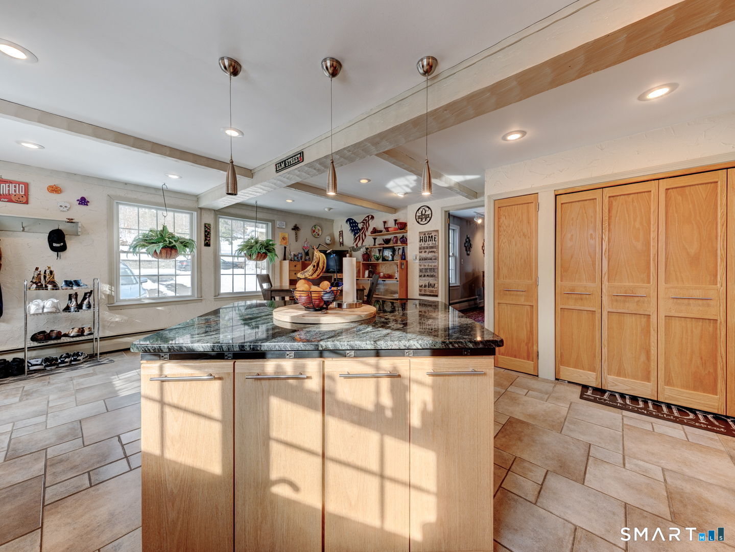 38 Eastwood Road Bristol, CT 06010 - Photo 12 of 40 a kitchen with granite countertop a sink and a counter top space