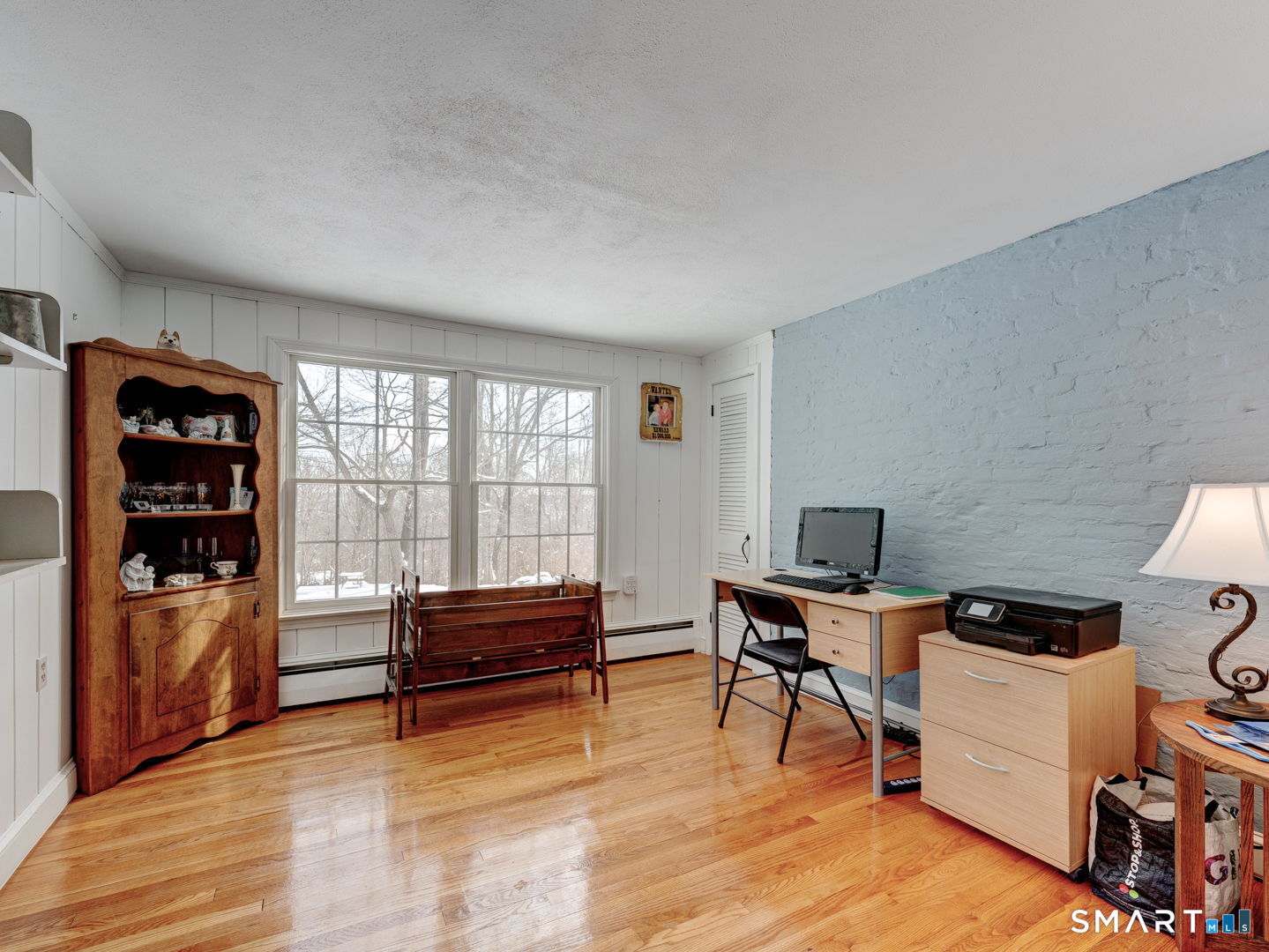 38 Eastwood Road Bristol, CT 06010 - Photo 19 of 40 a view of a workspace with furniture and a window