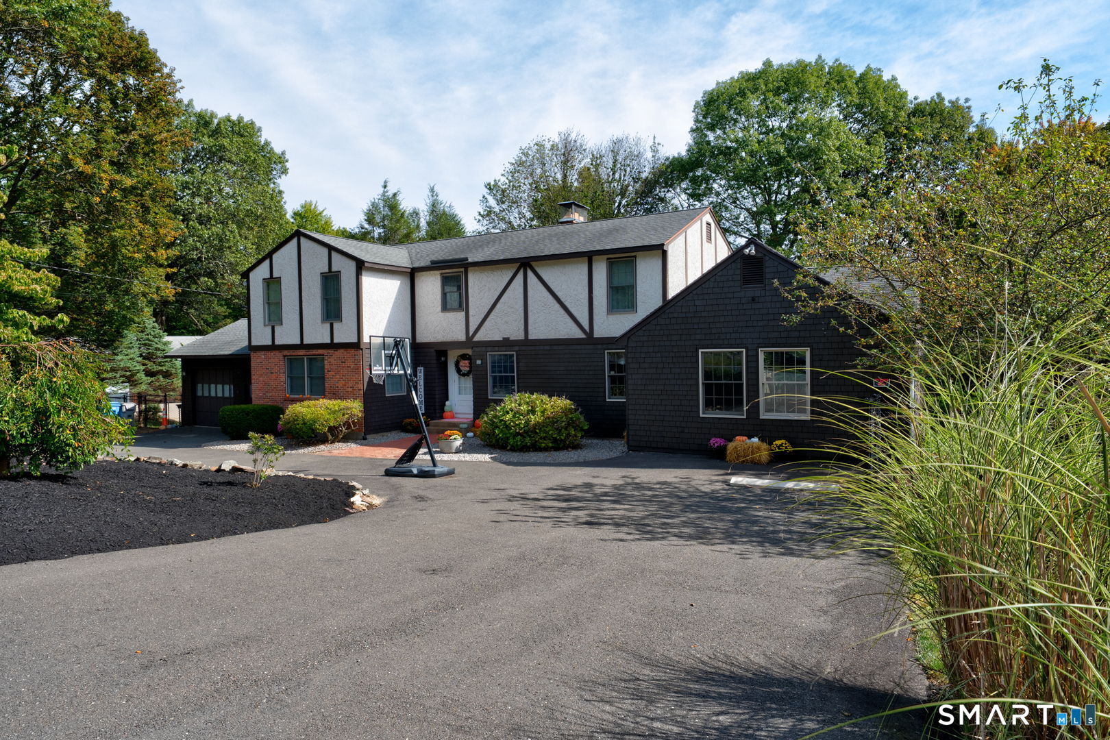 38 Eastwood Road Bristol, CT 06010 - Photo 2 of 40 a view of a house with a patio
