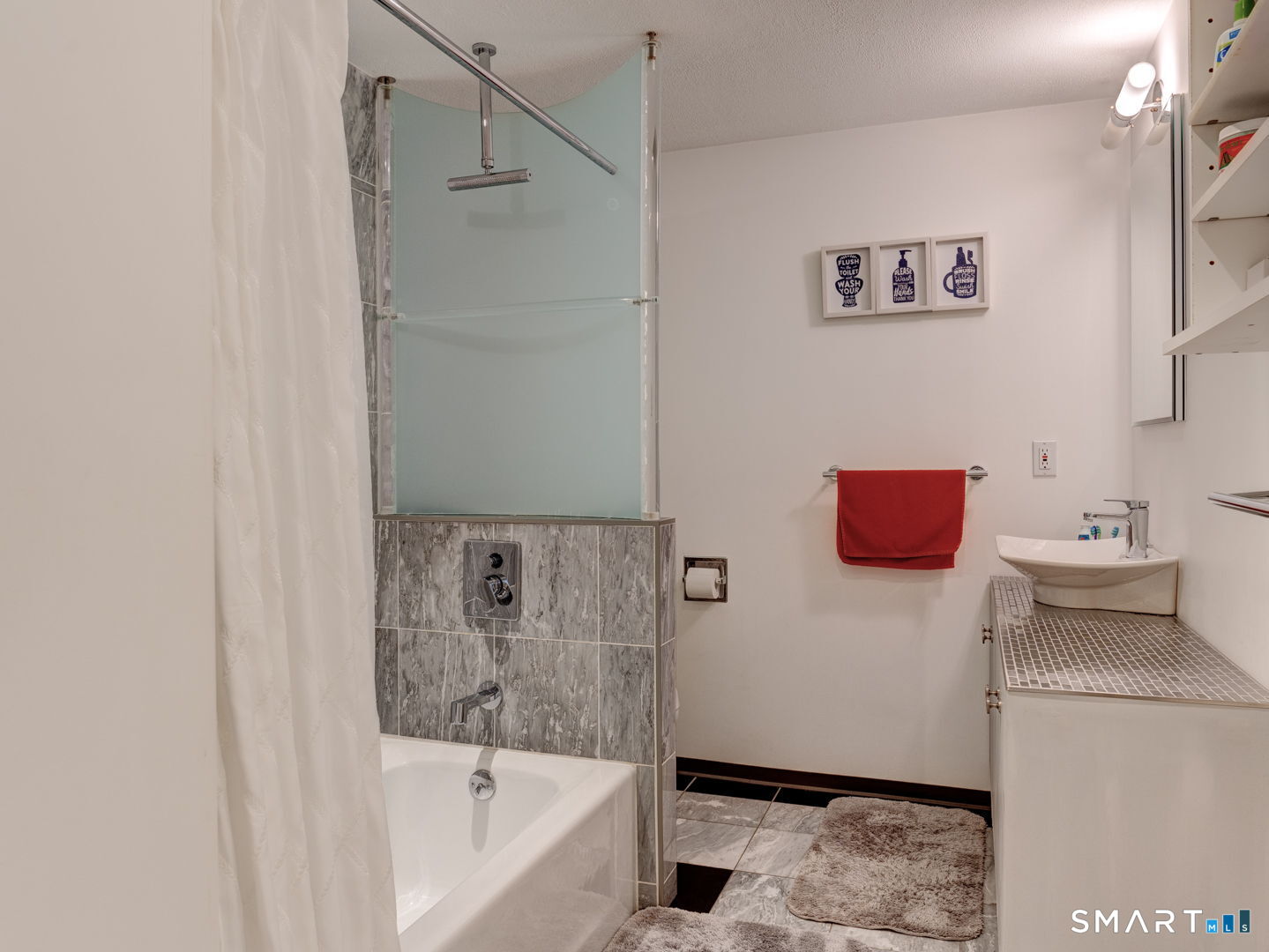 38 Eastwood Road Bristol, CT 06010 - Photo 22 of 40 a bathroom with a bathtub and a sink