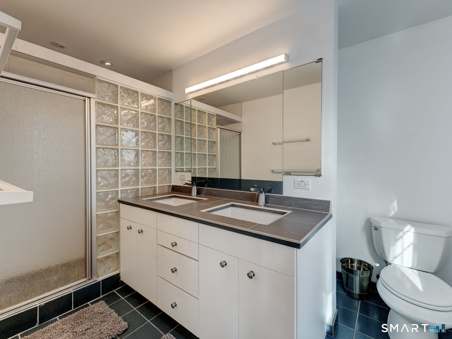38 Eastwood Road Bristol, CT 06010 - Photo 27 of 40 a bathroom with a granite countertop sink mirror and toilet