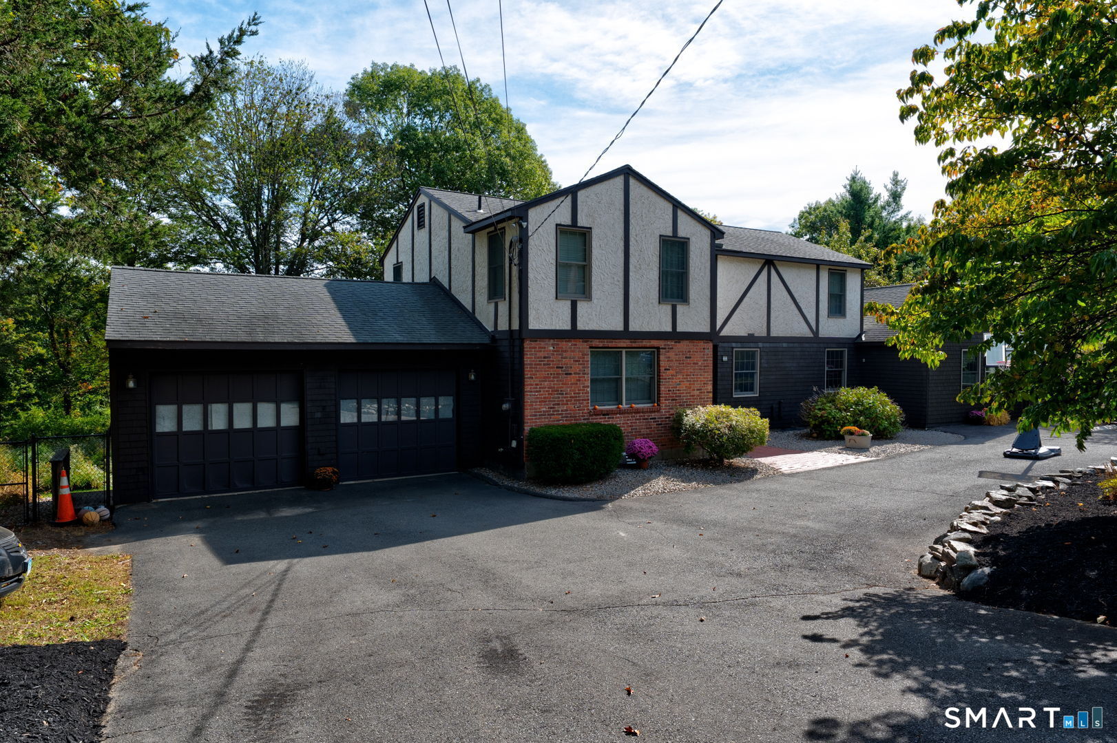 38 Eastwood Road Bristol, CT 06010 - Photo 3 of 40 a front view of a house with a yard