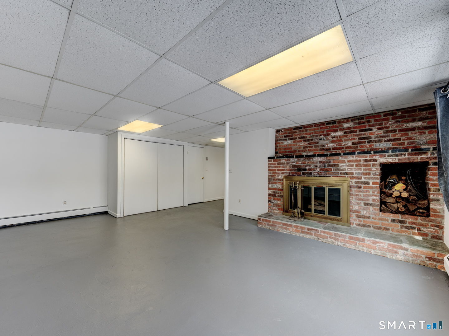38 Eastwood Road Bristol, CT 06010 - Photo 34 of 40 a view of an empty room with a fireplace