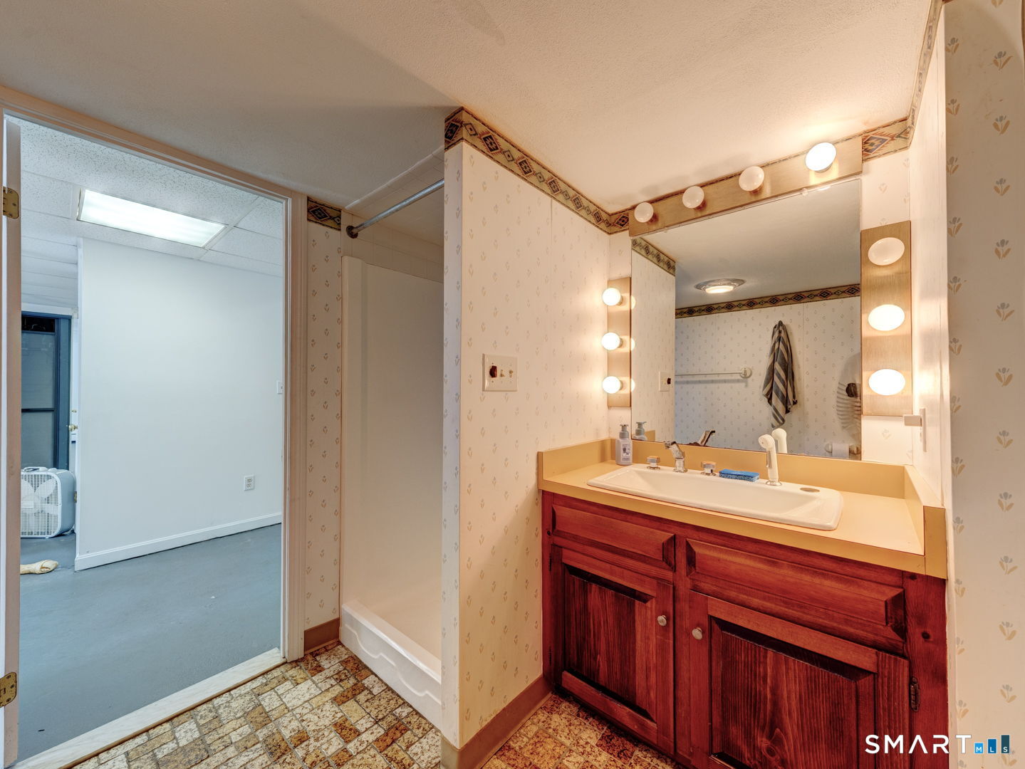 38 Eastwood Road Bristol, CT 06010 - Photo 36 of 40 a bathroom with a sink and a mirror