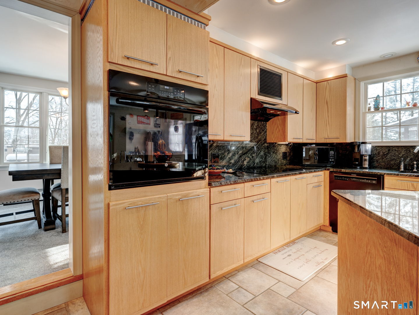 38 Eastwood Road Bristol, CT 06010 - Photo 10 of 40 a kitchen with stainless steel appliances granite countertop a refrigerator and a stove top oven
