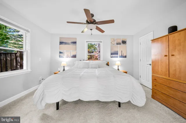 a bedroom with a bed and a closet