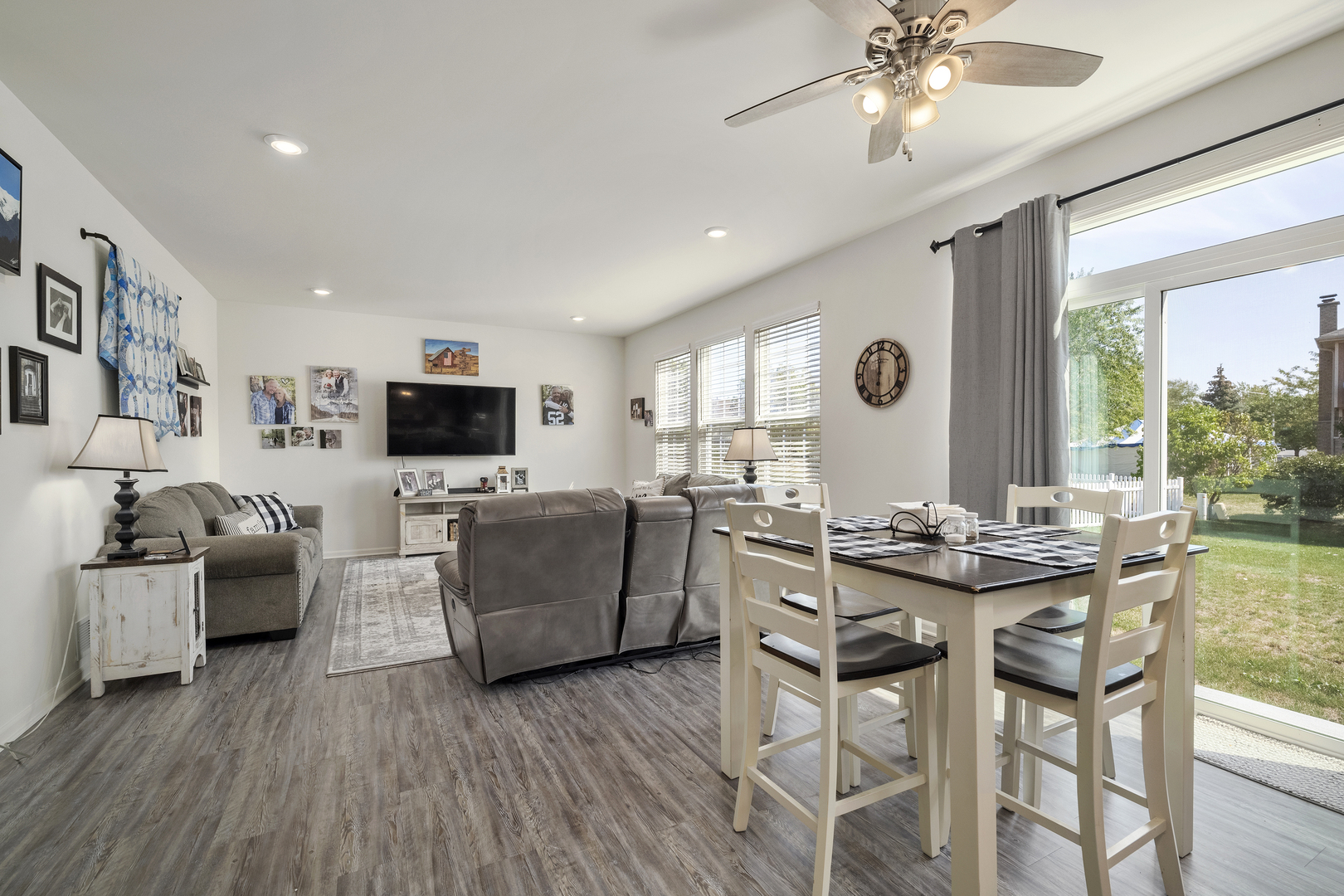 704 Long Ridge Trail Minooka, IL 60447 - Photo 14 of 33 a view of a dining room with furniture and wooden floor