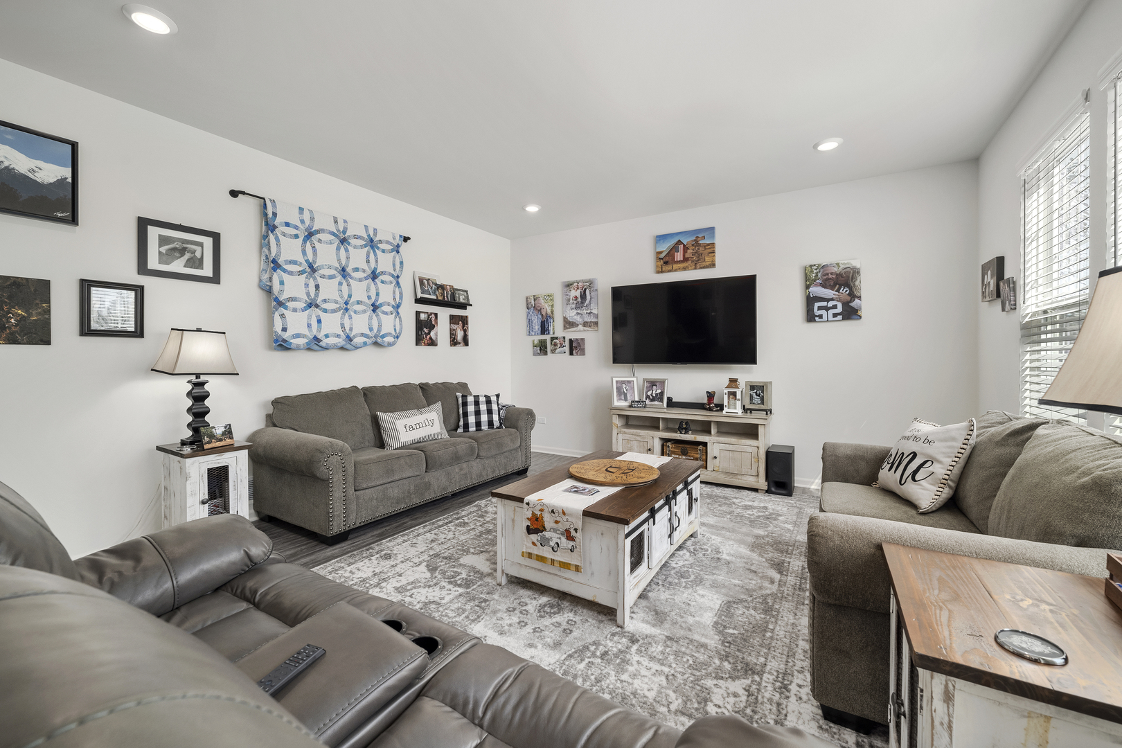 704 Long Ridge Trail Minooka, IL 60447 - Photo 16 of 33 a living room with furniture and a flat screen tv