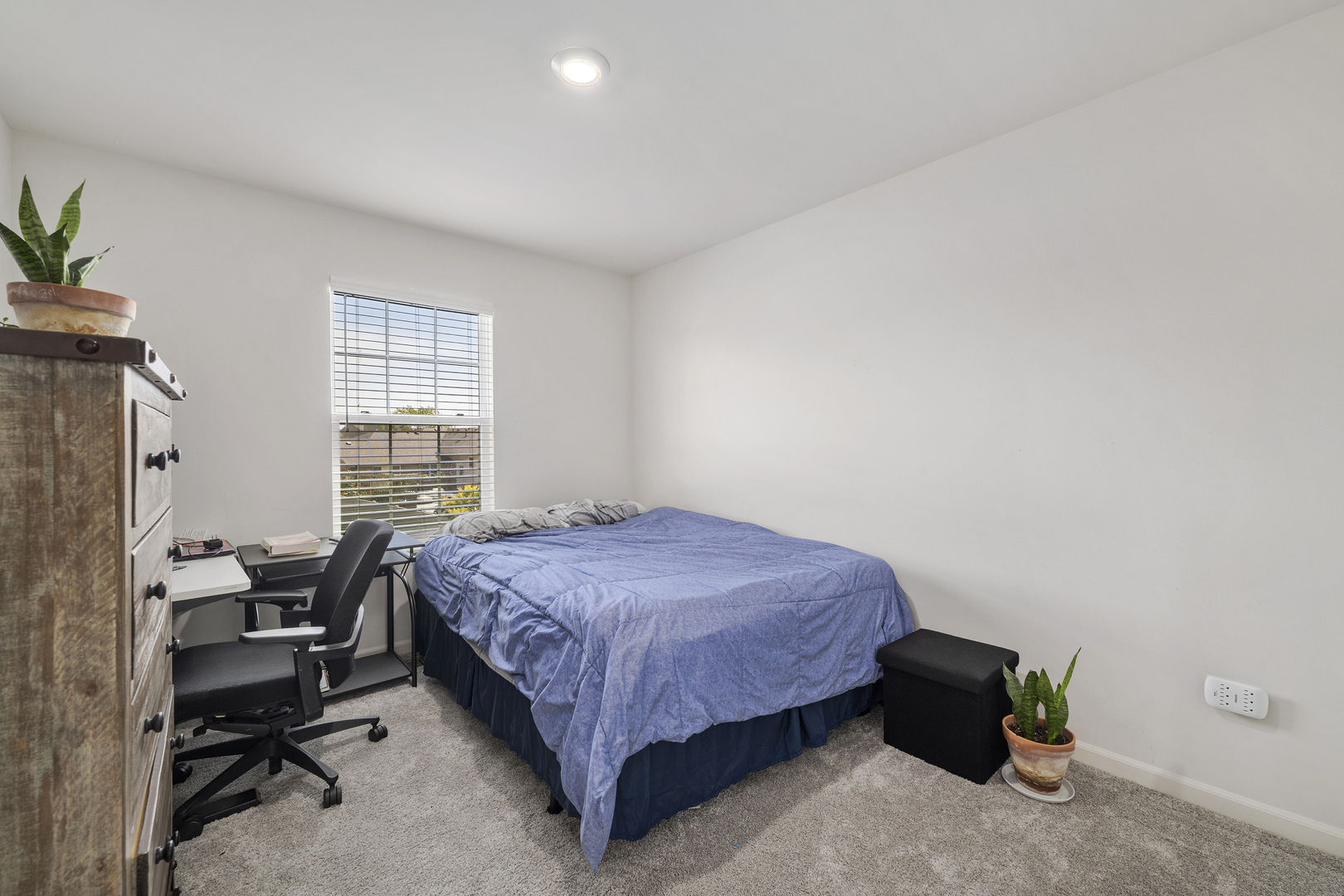 704 Long Ridge Trail Minooka, IL 60447 - Photo 26 of 33 a bedroom with a bed and a window