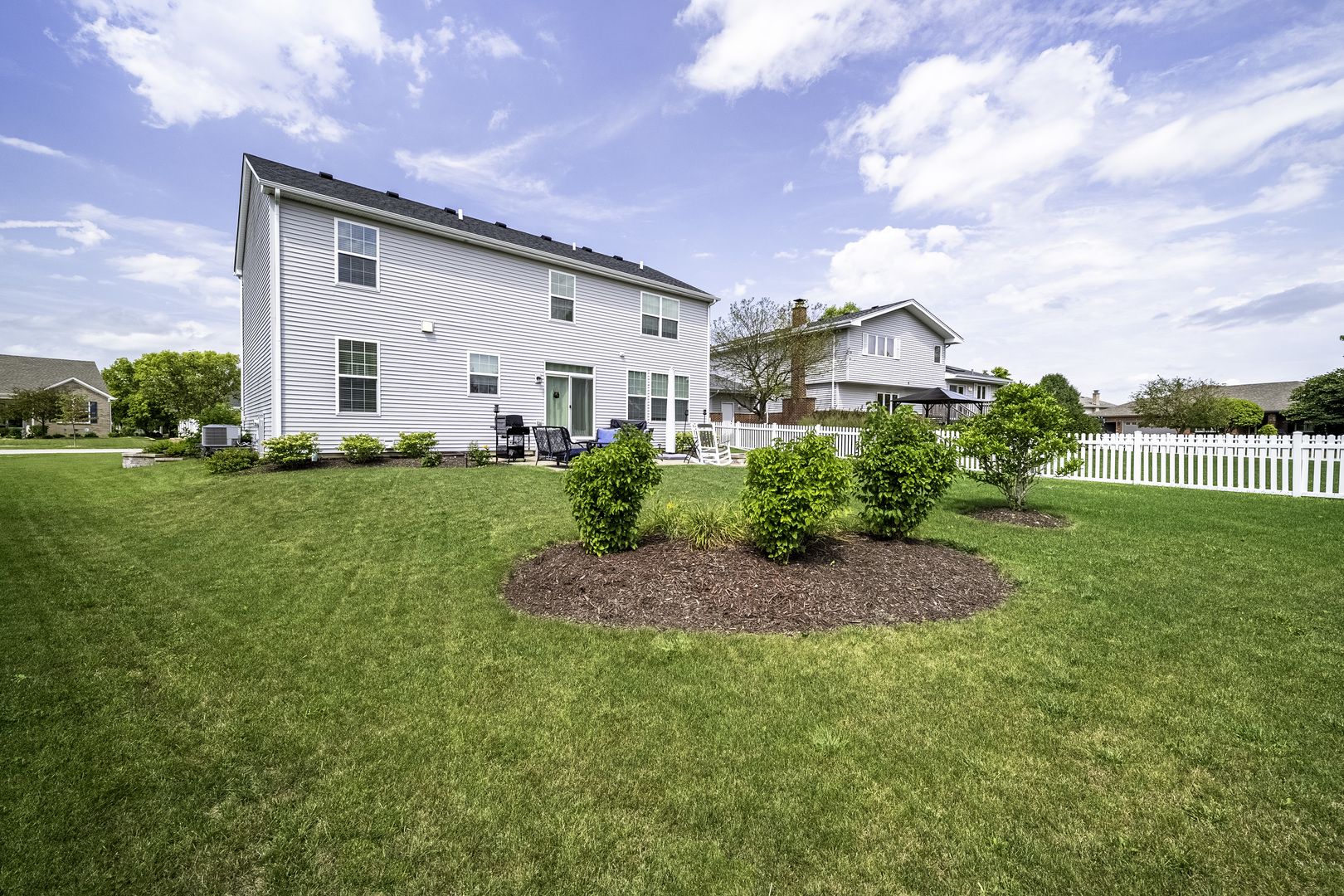 704 Long Ridge Trail Minooka, IL 60447 - Photo 29 of 33 a front view of a house with a yard