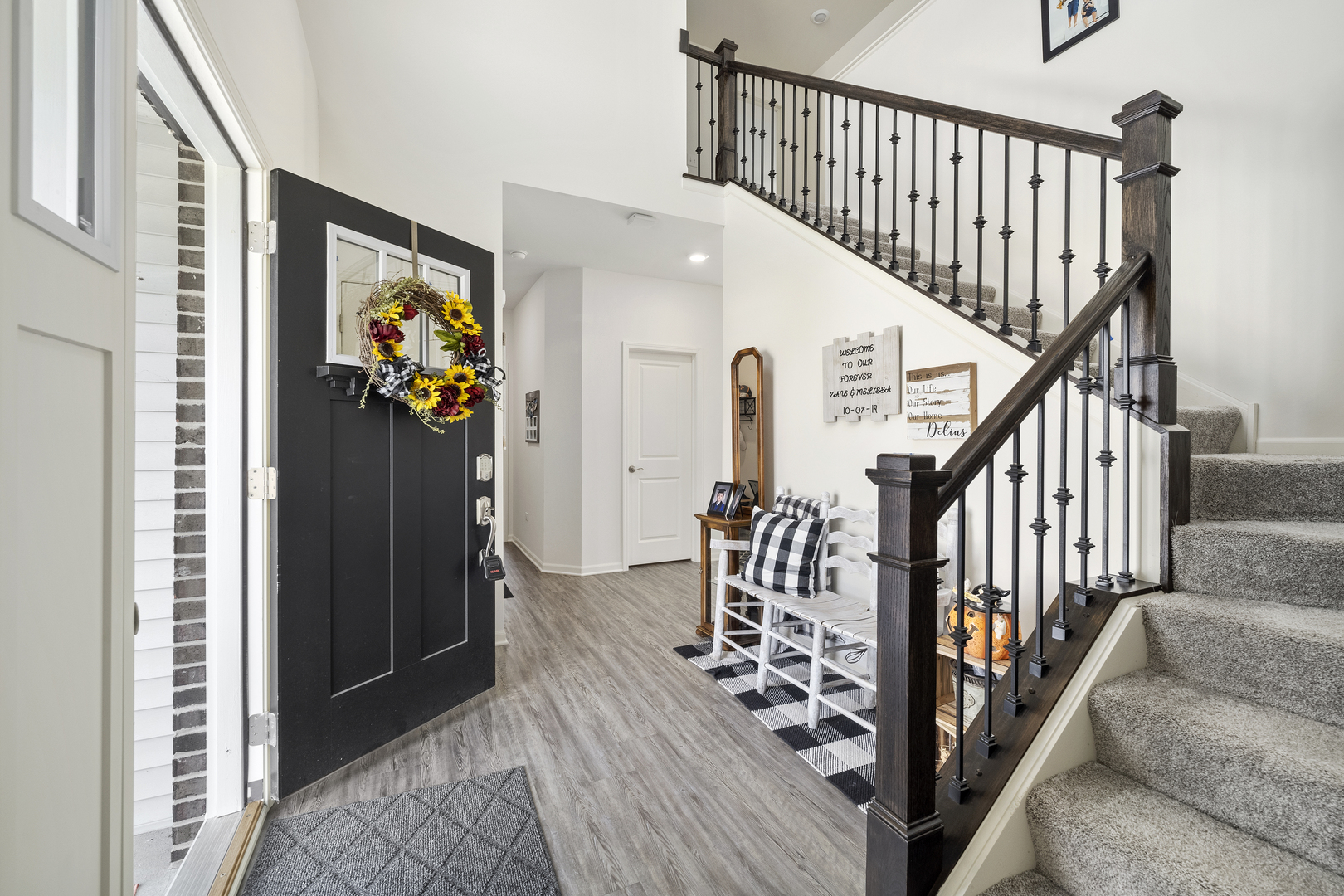 704 Long Ridge Trail Minooka, IL 60447 - Photo 5 of 33 a view of entryway with wooden floor and stairs