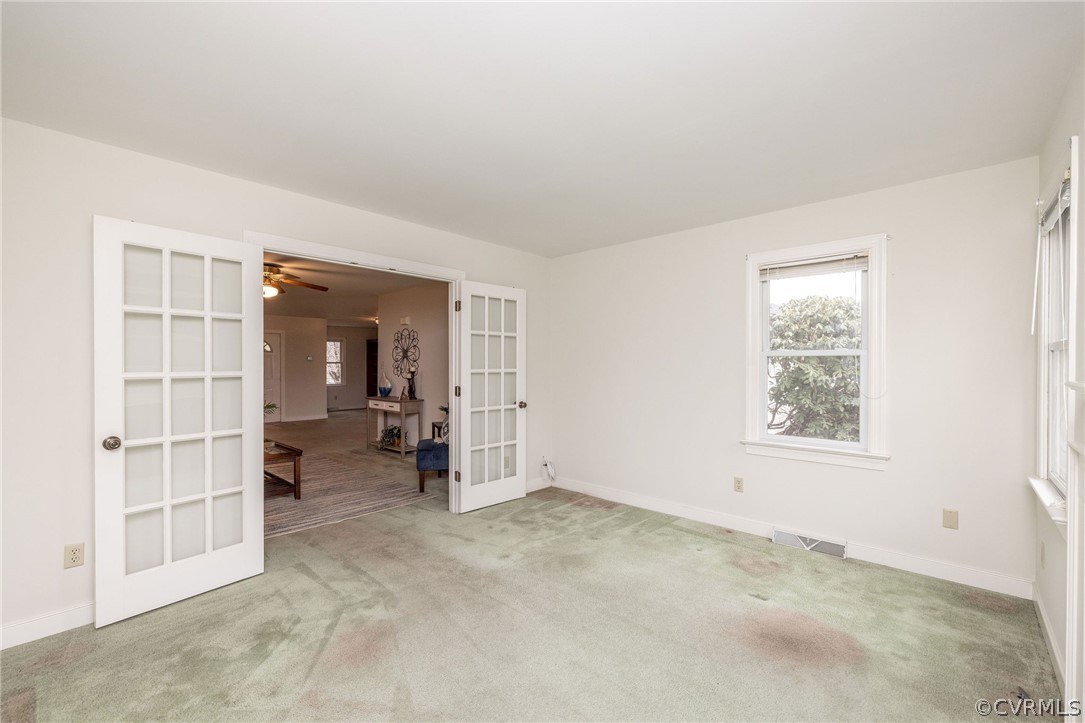 16004 Parsons Road Beaverdam, VA 23015 - Photo 13 of 47 an empty room with furniture and windows