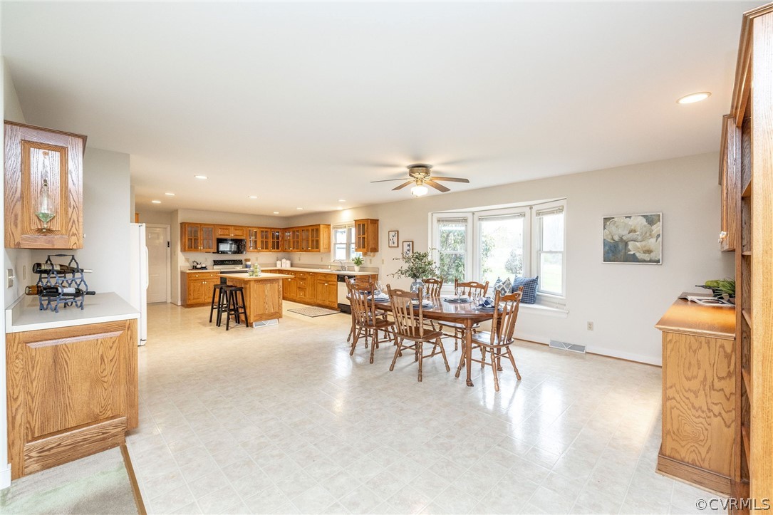 16004 Parsons Road Beaverdam, VA 23015 - Photo 14 of 47 a view of a dining area with furniture and a livingroom