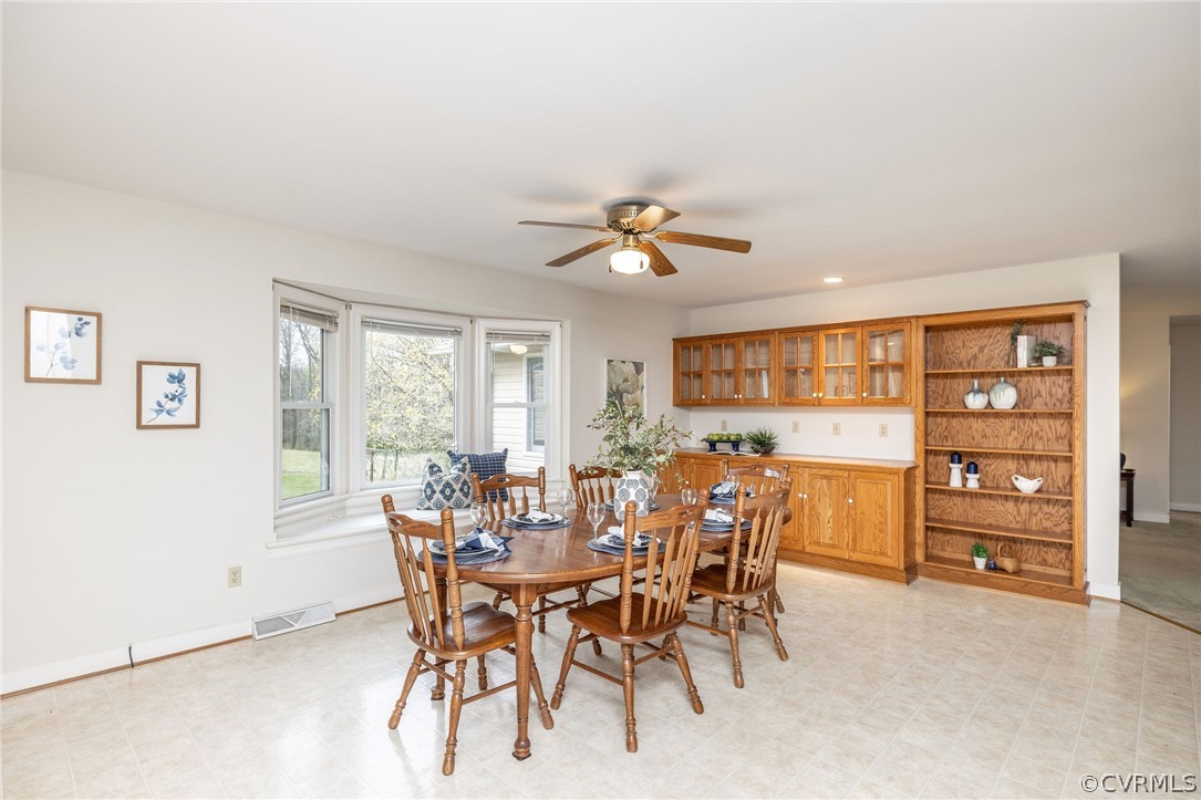 16004 Parsons Road Beaverdam, VA 23015 - Photo 15 of 47 a view of a dining room with furniture and a window