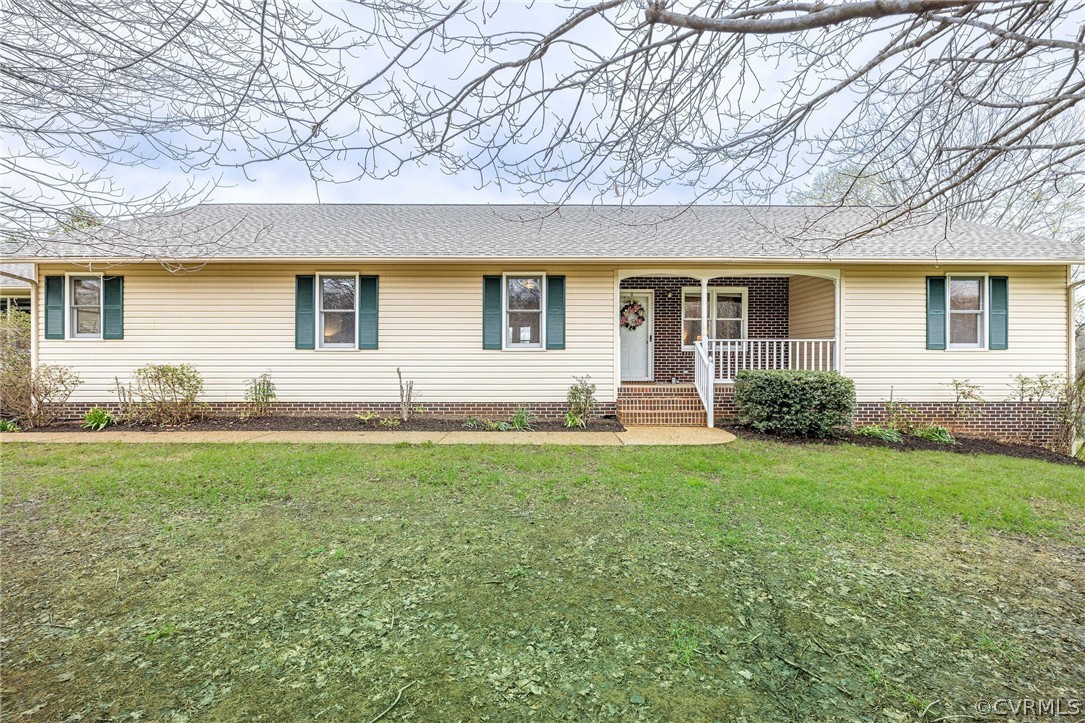 16004 Parsons Road Beaverdam, VA 23015 - Photo 2 of 47 front view of a house with a yard