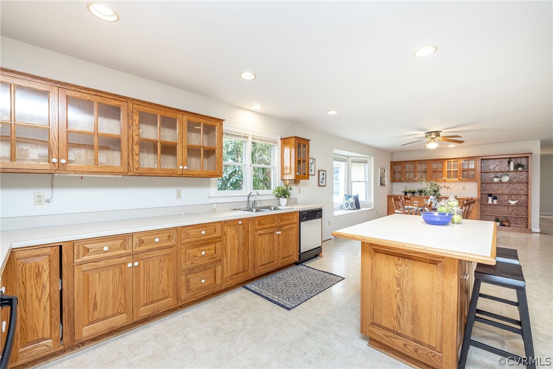 16004 Parsons Road Beaverdam, VA 23015 - Photo 21 of 47 a large kitchen with kitchen island a sink stainless steel appliances and cabinets