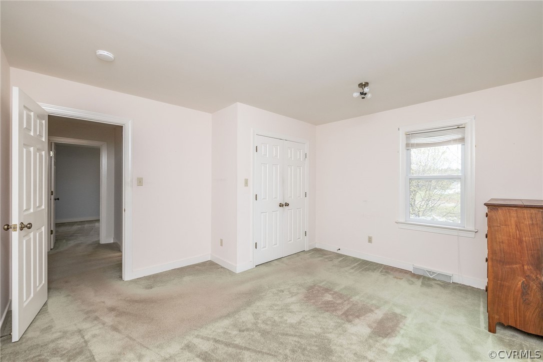 16004 Parsons Road Beaverdam, VA 23015 - Photo 24 of 47 an empty room with windows