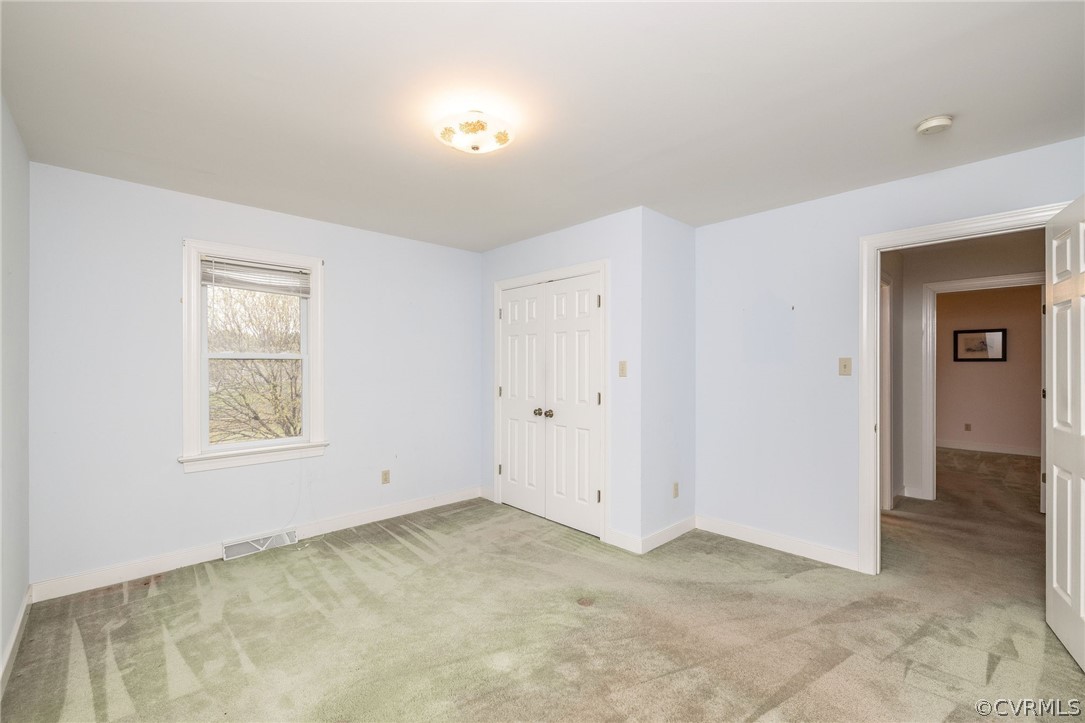 16004 Parsons Road Beaverdam, VA 23015 - Photo 29 of 47 an empty room with windows