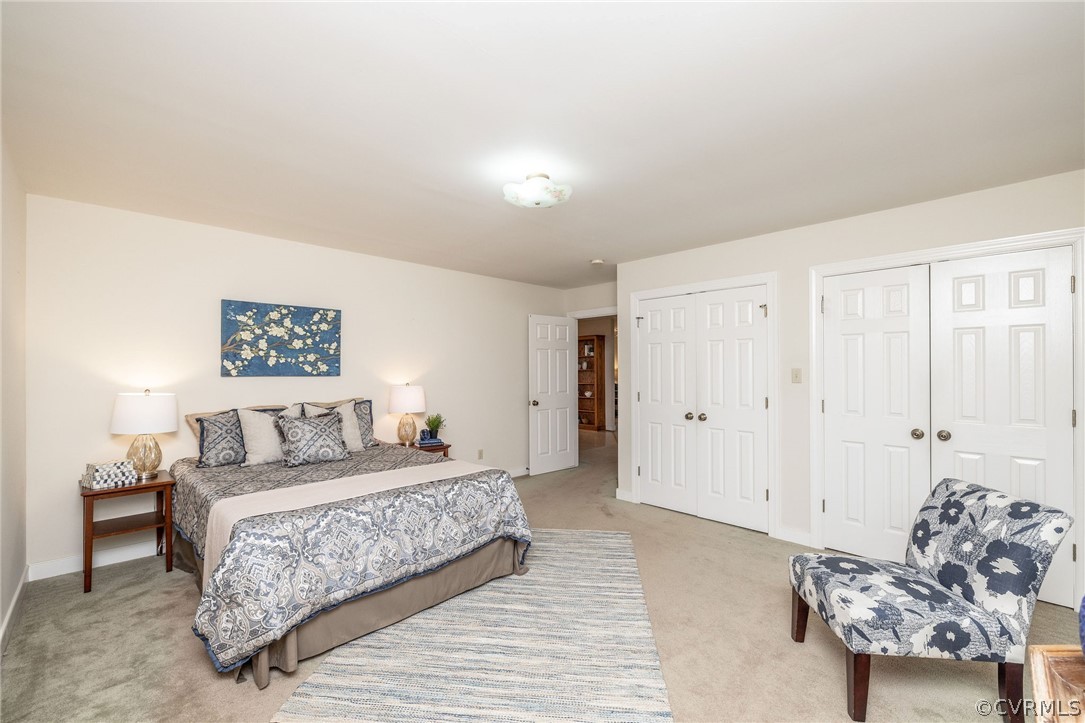 16004 Parsons Road Beaverdam, VA 23015 - Photo 32 of 47 a bedroom with a bed and a lamp on table