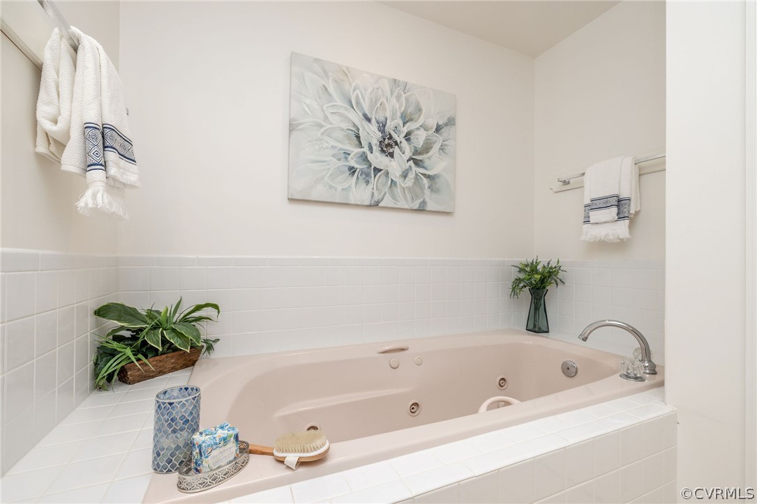 16004 Parsons Road Beaverdam, VA 23015 - Photo 36 of 47 a bathroom with a bathtub and a shower