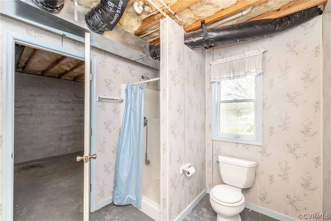 16004 Parsons Road Beaverdam, VA 23015 - Photo 41 of 47 a bathroom with a shower and a toilet