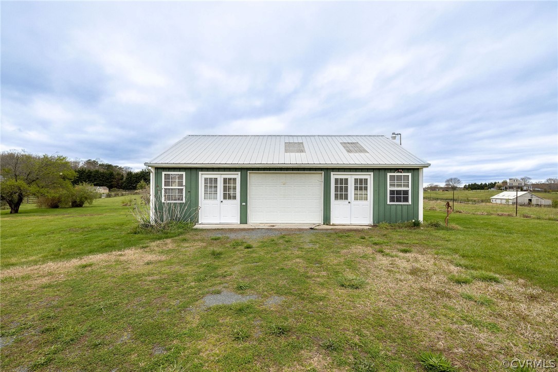 16004 Parsons Road Beaverdam, VA 23015 - Photo 43 of 47 a front view of house with yard and garage
