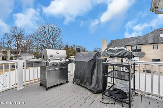 a view of a chairs and table in a patio