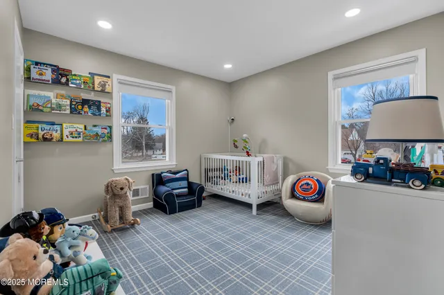 a bedroom with furniture and a bed