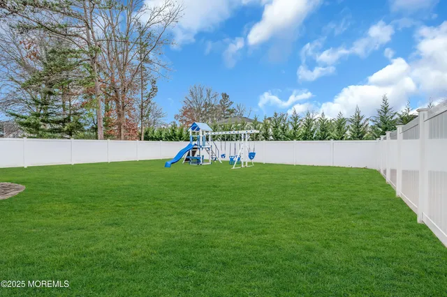 a view of yard with entertaining space