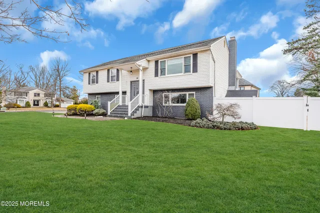a view of a house with a big yard