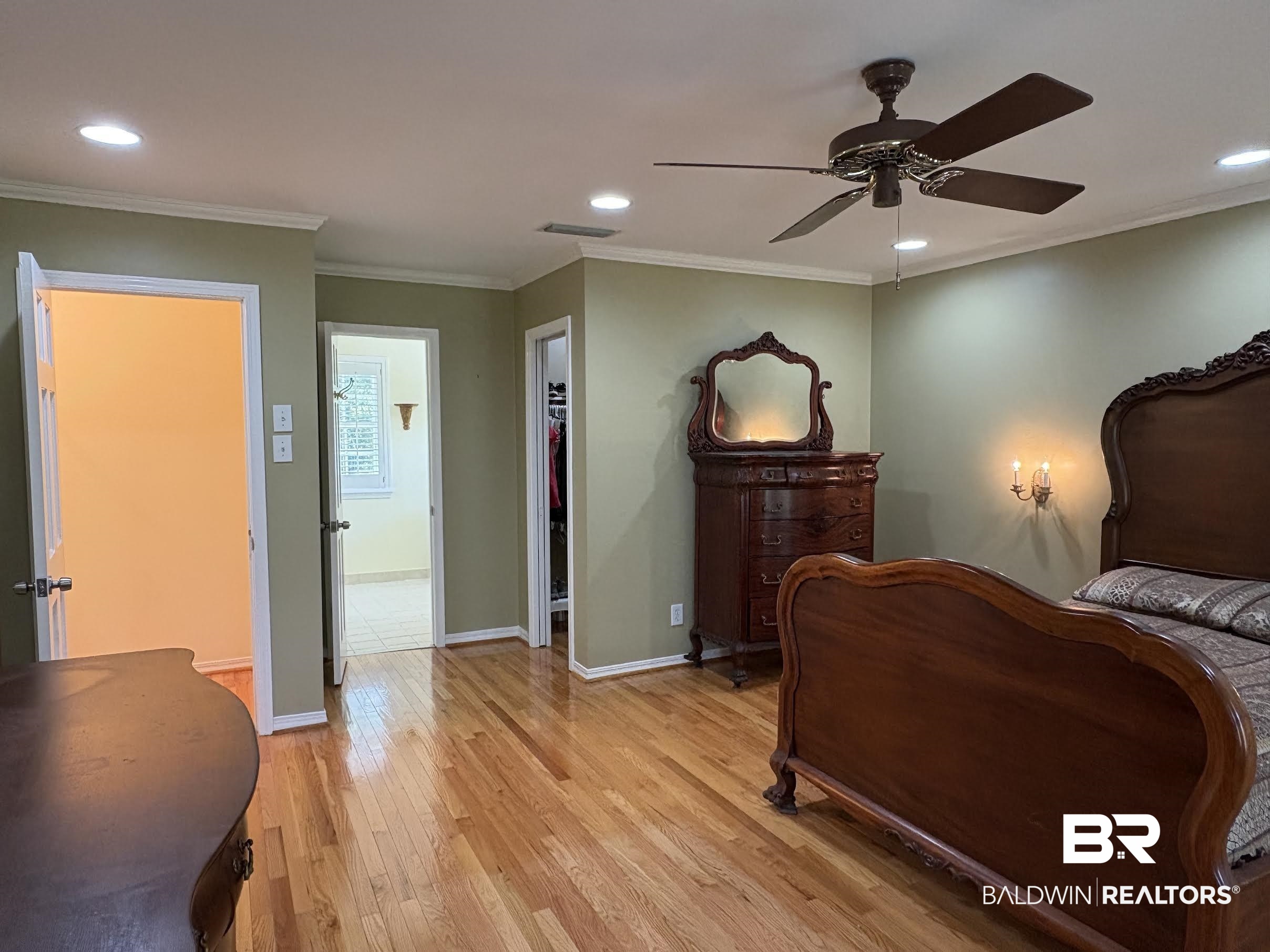 6105 Brandy Run Road South Mobile, AL 36608 - Photo 27 of 45 Bedroom featuring light wood-style floors, recessed lighting, baseboards, ceiling fan, and crown molding