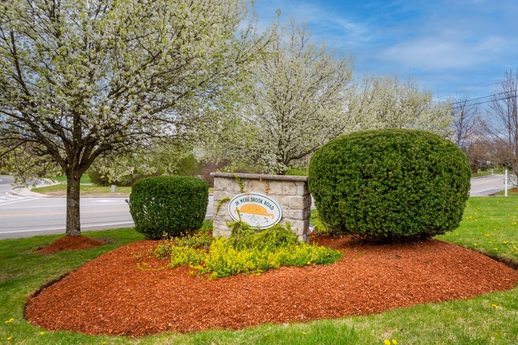 36 Webb Brook Road, Unit 4 Billerica, MA 01821 - Photo 2 of 21 a view of a backyard