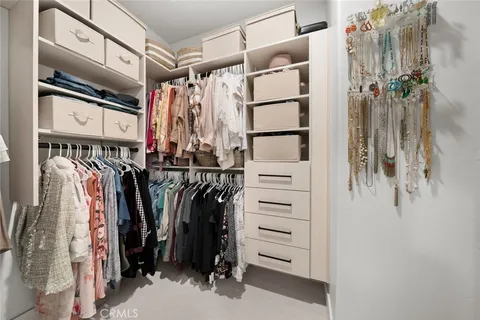 an aerial view of residential houses with outdoor space and river