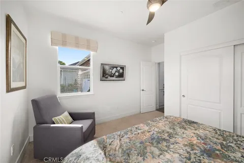 an aerial view of a house with a lake view