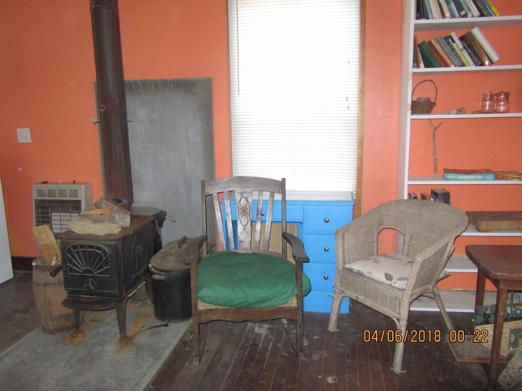 127 Kelley Point Road Jonesport, ME 04649 - Photo 6 of 10 Living room with woodstove