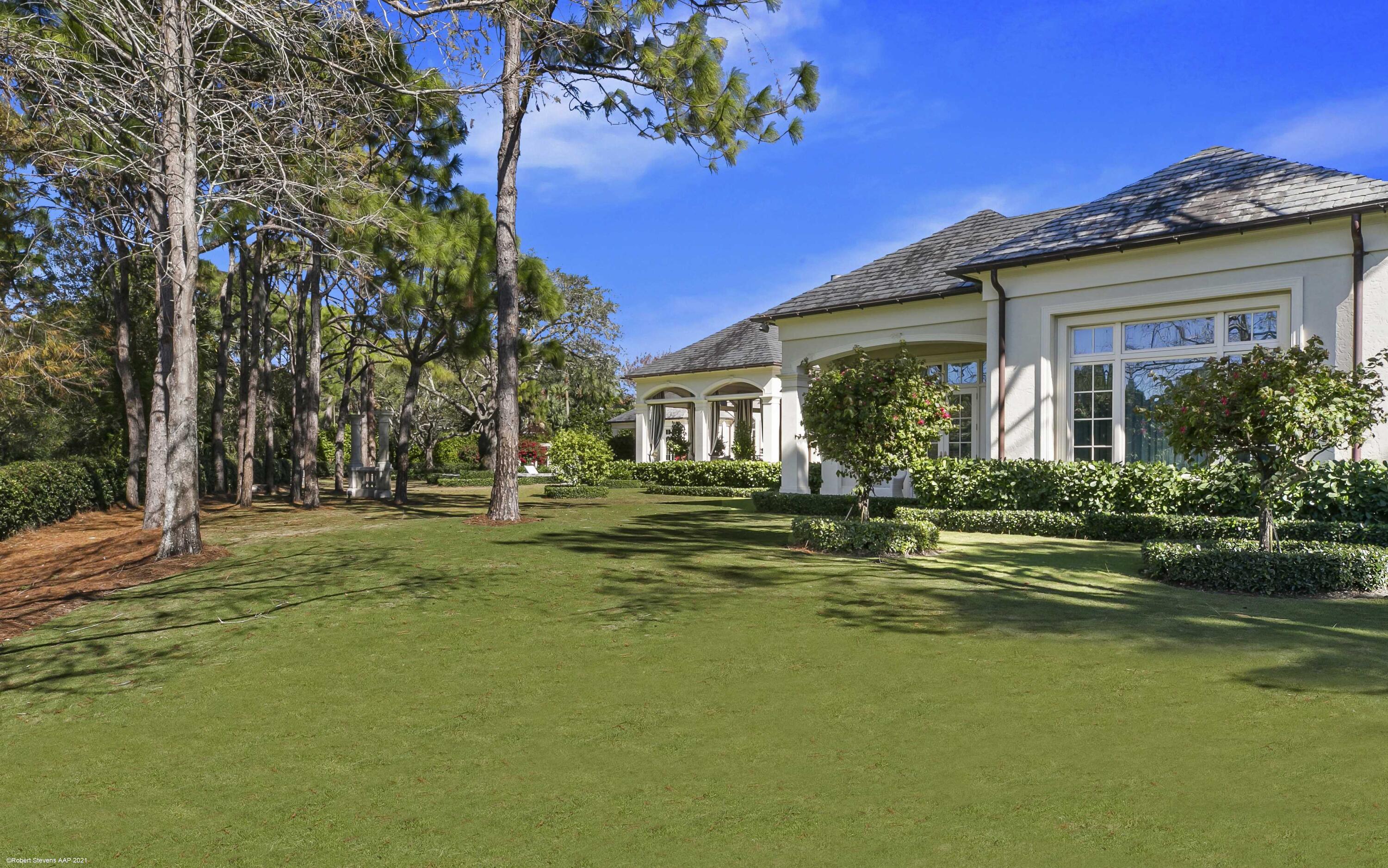 146 Bears Club Drive Jupiter, FL 33477 - Photo 72 of 115 Rear Lawn