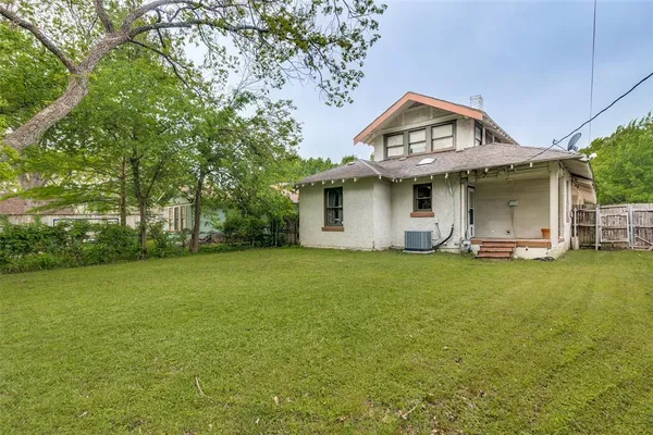 a view of a house with a garden