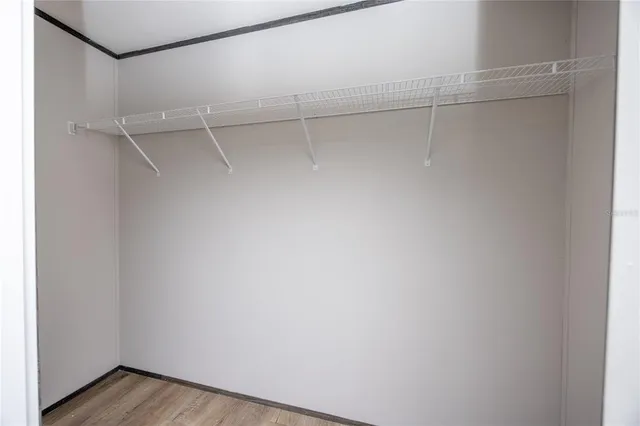 a view of a room with racks on the wall