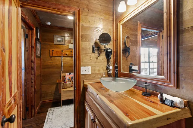 a room with table closet and glass door