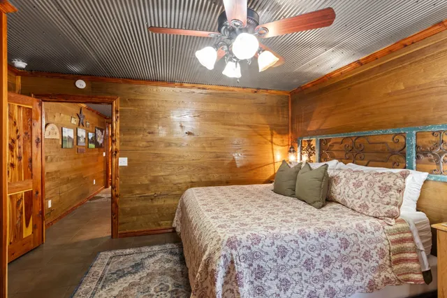 a bedroom with a bed and a walk in closet