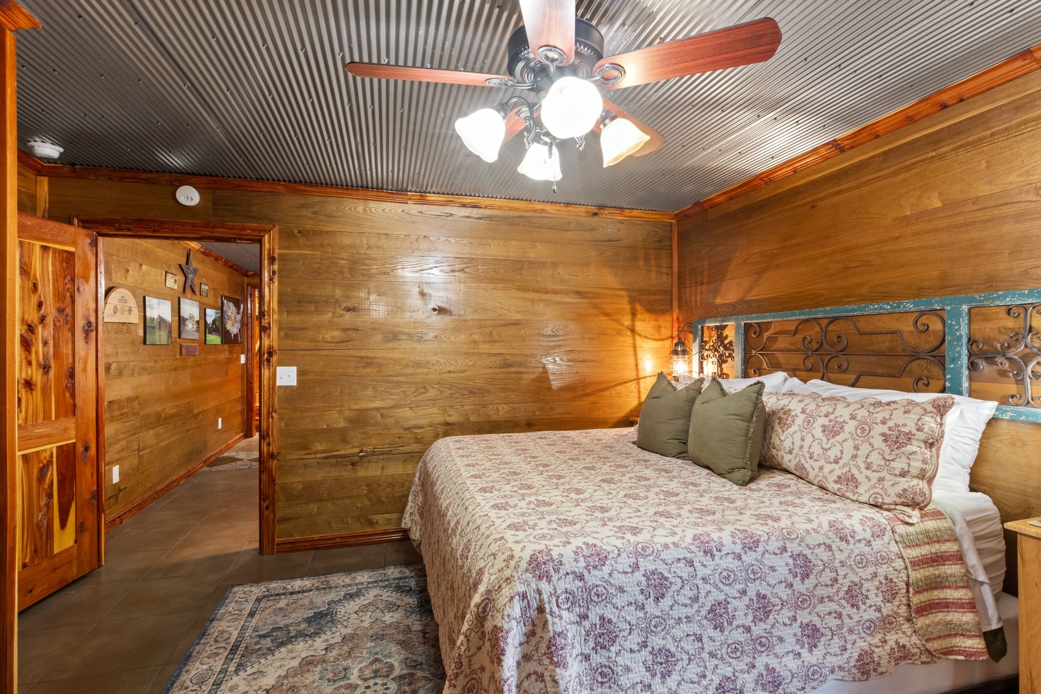 784 Damron Road Lynchburg, TN 37352 - Photo 30 of 38 a bedroom with a bed and a walk in closet