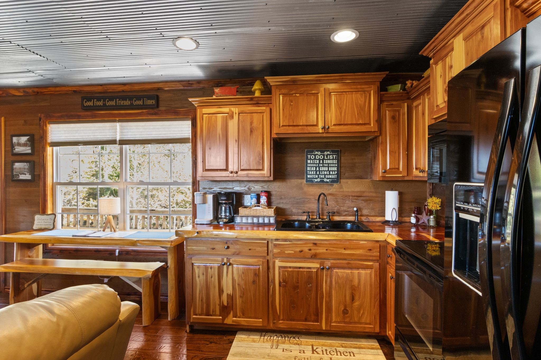 784 Damron Road Lynchburg, TN 37352 - Photo 3 of 38 a kitchen with stainless steel appliances granite countertop a stove a sink and a refrigerator