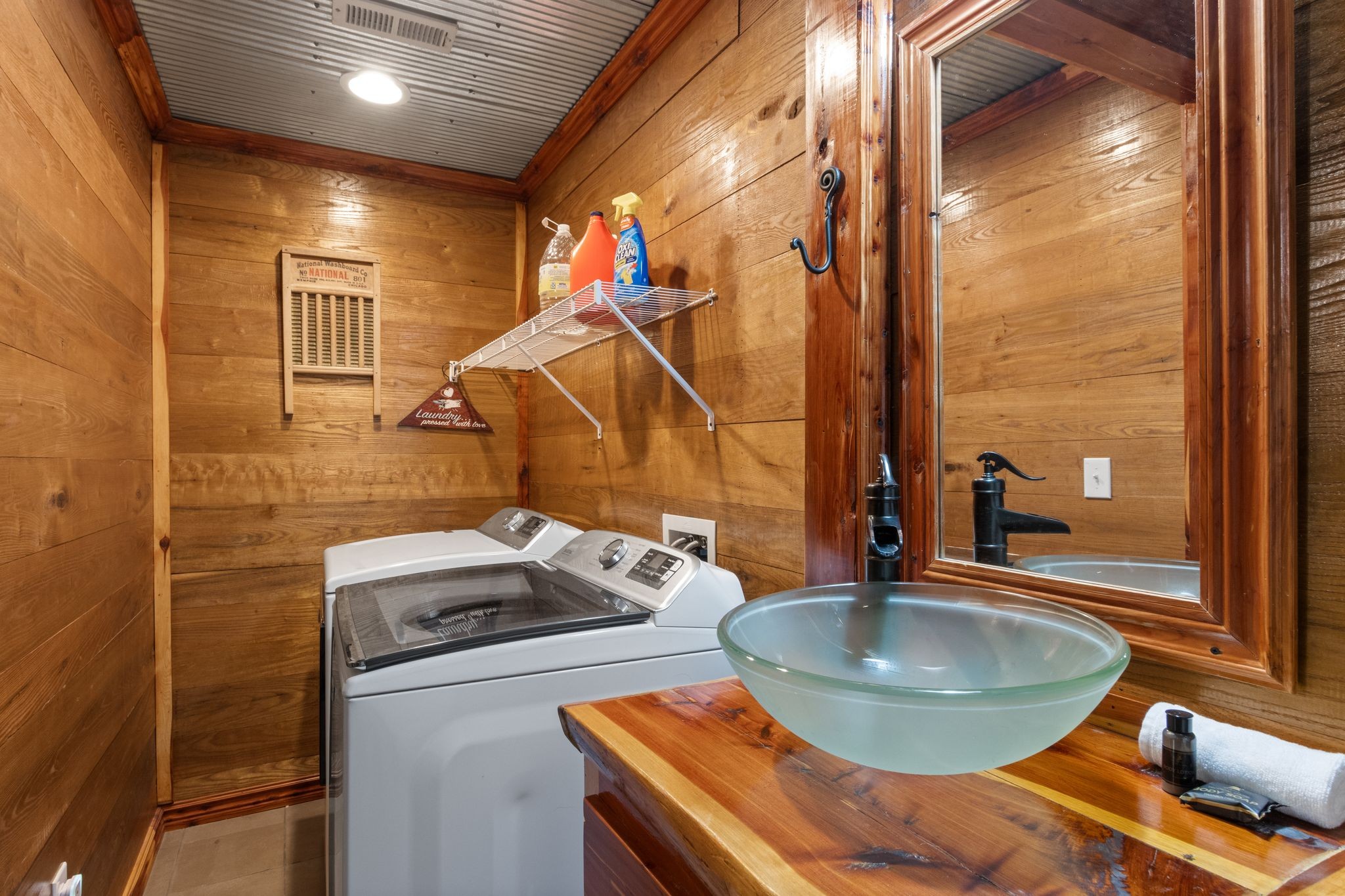 784 Damron Road Lynchburg, TN 37352 - Photo 32 of 38 a bathroom with a sink and a mirror