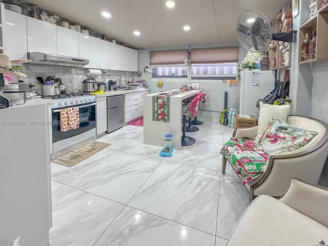 a bathroom with a toilet and a sink