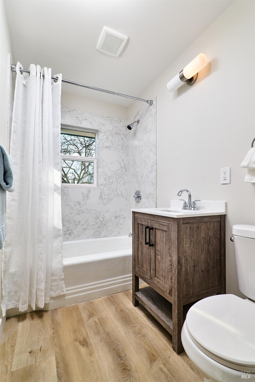 736 Nevada Street Fairfield, CA 94533 - Photo 22 of 36 a bathroom with a sink a toilet and bathtub